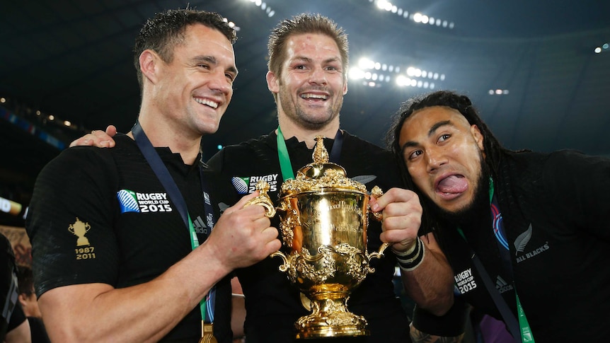 All Blacks Dan Carter, Richie McCaw and Ma'a Nonu with the Webb Ellis trophy