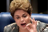 Dilma Rousseff answers questions during her impeachment trial.