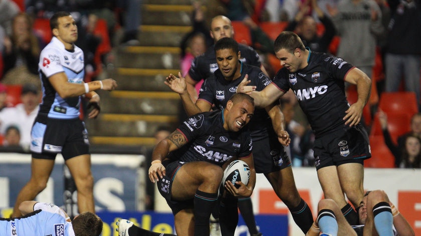 Crouching Panther...Frank Pritchard scored a hat-trick for the home side.
