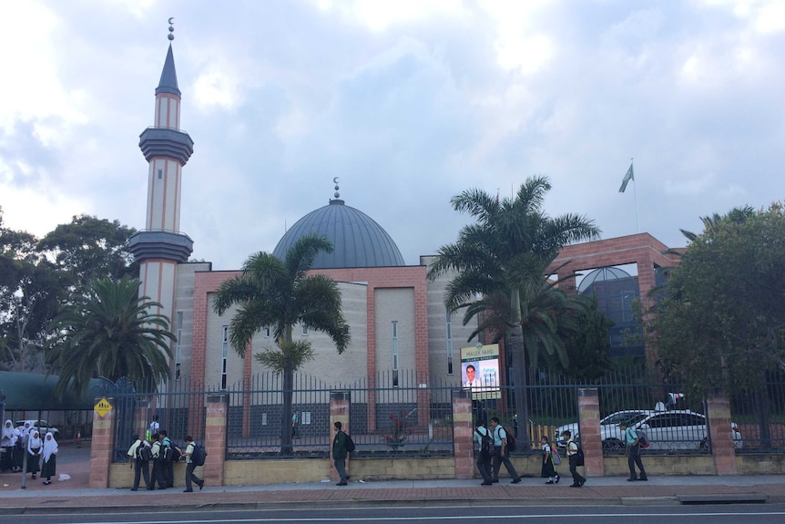 Students outside Malek Fahd Islamic School in Sydney's south-west.