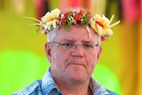Scott Morrison wearing a tropical shirt and floral crown