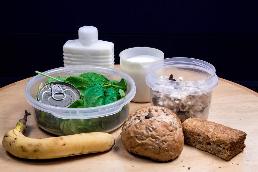 A table of food in containers