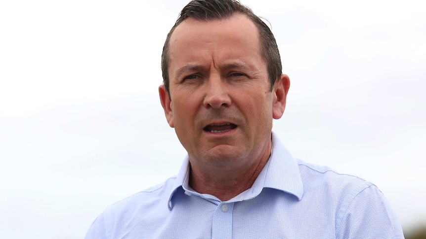 A head and shoulders shot of WA Premier Mark McGowan talking outdoors during a media conference.