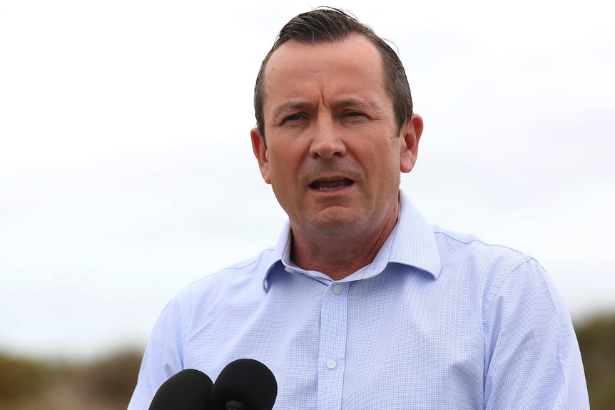 A head and shoulders shot of WA Premier Mark McGowan talking outdoors during a media conference.