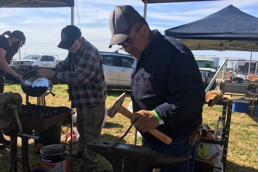 Two blacksmiths in action in South Australia's Riverland.