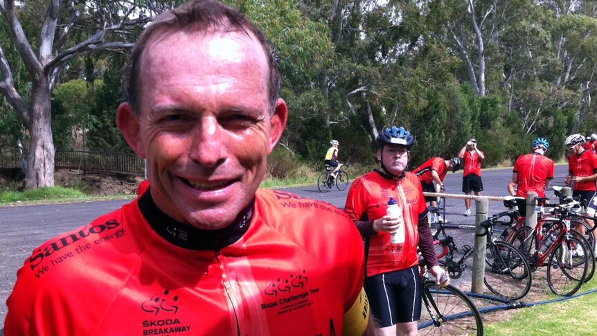 Tony Abbott competes in the community challenge ride during the Tour Down Under.