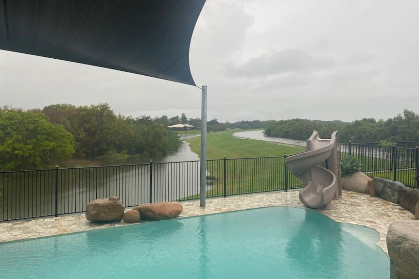 Looking over a pool to two flooded channels.