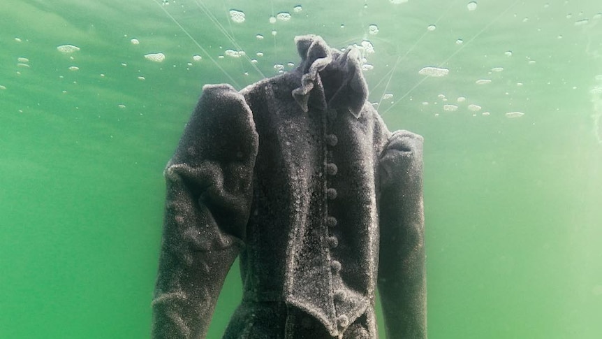 Salt Bride gown submerged and crystallised with salt after three months in the Dead Sea.