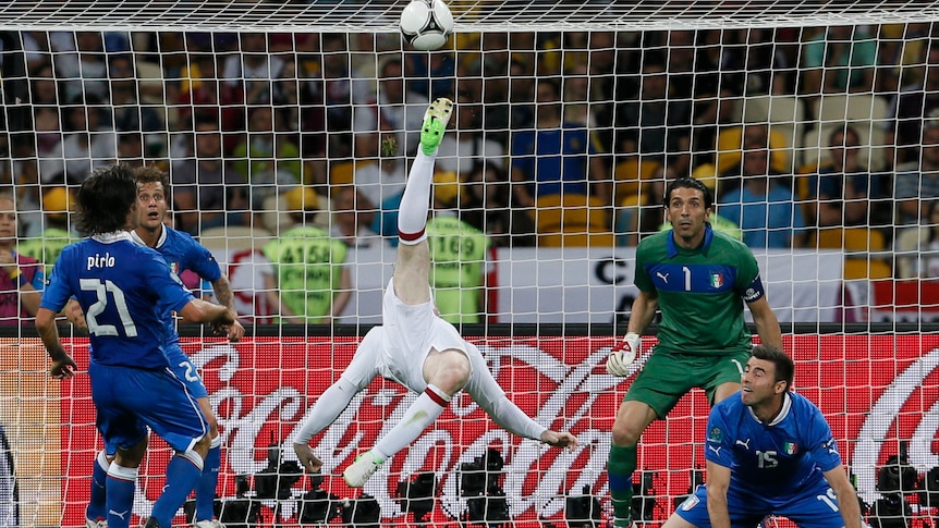 Wayne Rooney performs a bicycle kick during England's Euro 2012 quarter-final against Italy.
