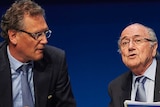 FIFA president Sepp Blatter (R) speaks to FIFA secretary general Jerome Valcke in March 2015.