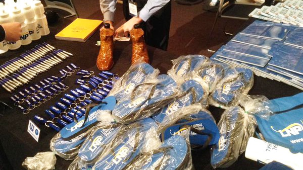 LNP merchandise such as thongs, key rings, water bottles and bags at the 2015 LNP Convention in Brisbane