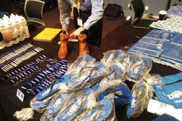 LNP merchandise such as thongs, key rings, water bottles and bags at the 2015 LNP Convention in Brisbane