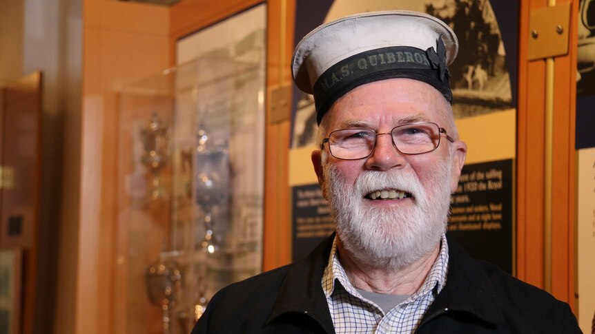 Roger Dewar wearing his Australian Navy cap which was returned to him after more than 50 years.