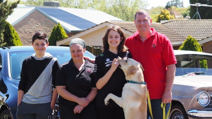 Former Holden worker Jason Couzner and his family