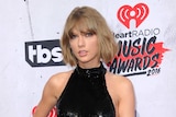 Taylor Swift looks sultry on the red carpet