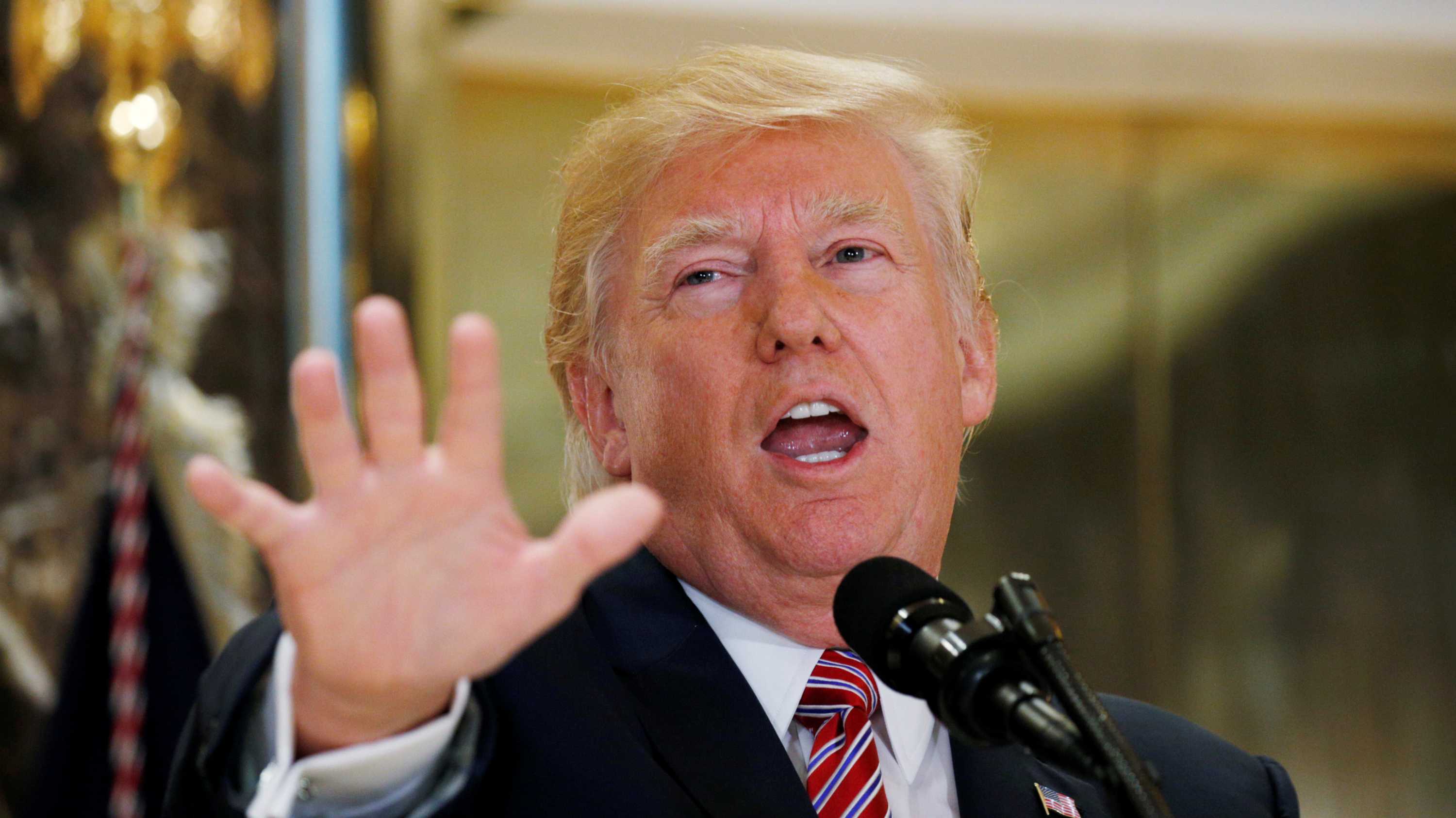 US President Donald Trump addresses a press conference.