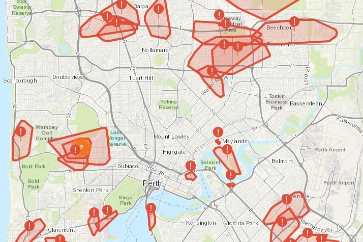 A map shows many red zones without power in suburbs across Perth.