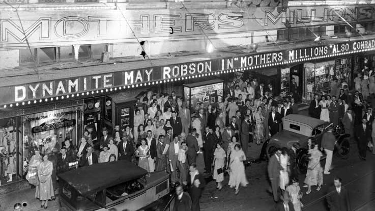 An evening crowd leaves the Ambassadors Theatre, Hay Street, Perth, 1932