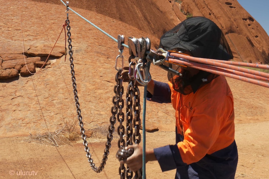 Uluru chains and posts removed, but it may take 'thousands of years' for the rock to return to normal.