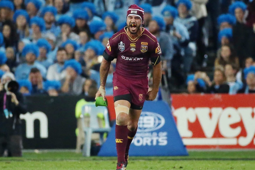 Johnathan Thurston shrieks after winning Origin II for Queensland