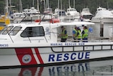 Staff aboard Marine Rescue NSW boat at Middle harbour in Sydney. Good generic.