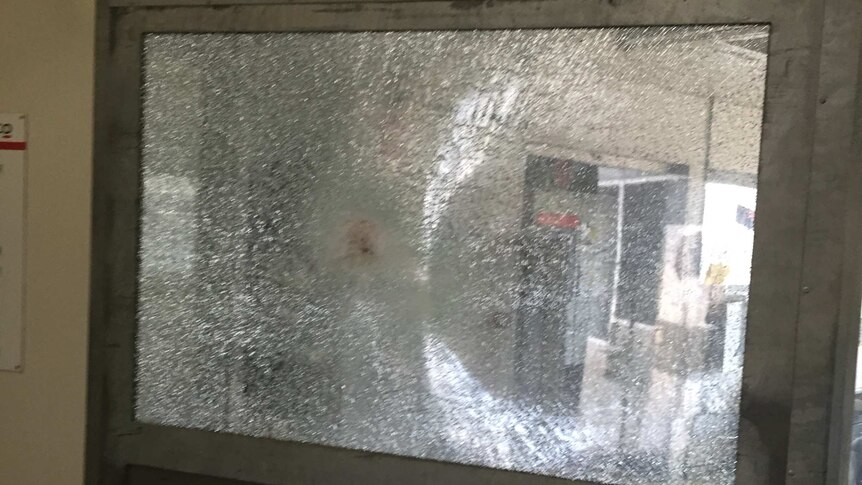 Smashed window at Christmas Island detention centre