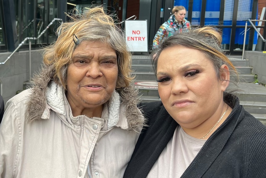 Christine Charles and Ajia Jacklyn Charles-Hamilton appear sombre outside the hospital.