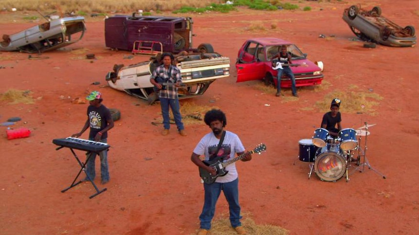 Warralong man Willy Kickett with his band Karntimarta