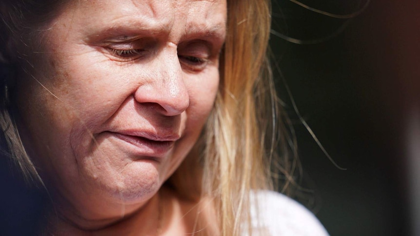 A close-up shot of a crying woman's face.