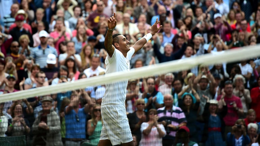 Australia's Nick Kyrgios celebrates his win over Rafael Nadal in the fourth round at Wimbledon 2014.