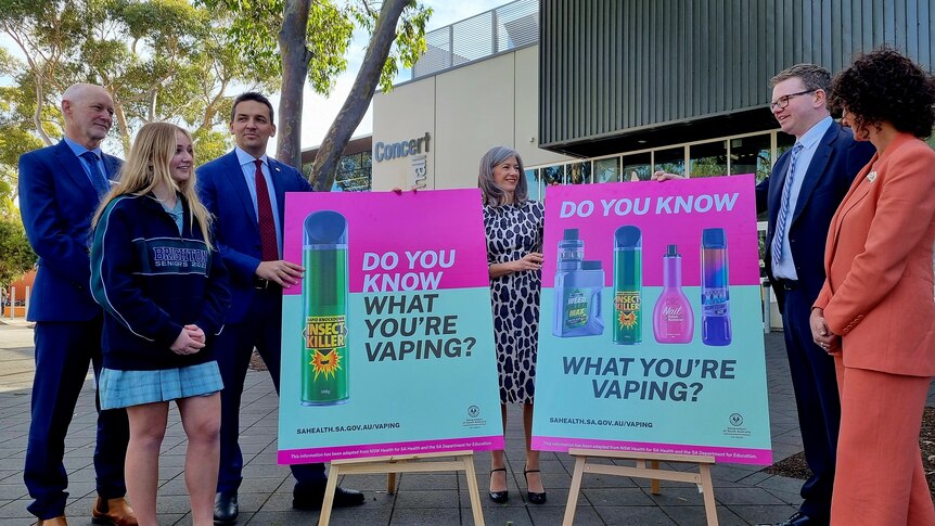 SA's education minister and health minister stand beside advertising warning students about what's in vapes