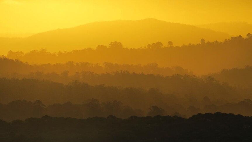 A golden sunlight over the hills