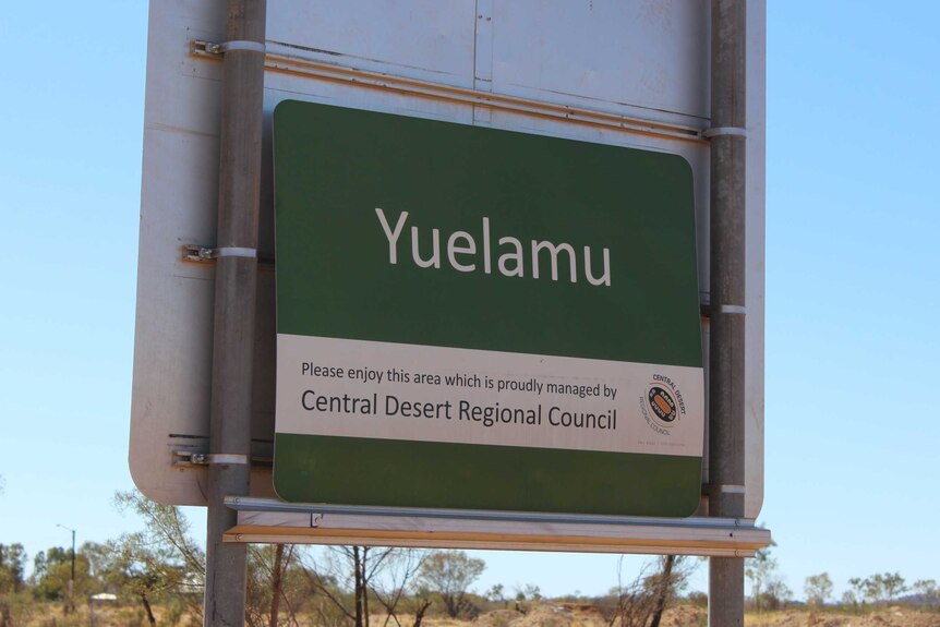 A sign at the entrance of the Yuelamu community.