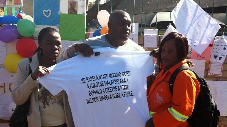 A man stands outside the hospital in Pretoria, where Nelson Mandela remains in a critical condition.