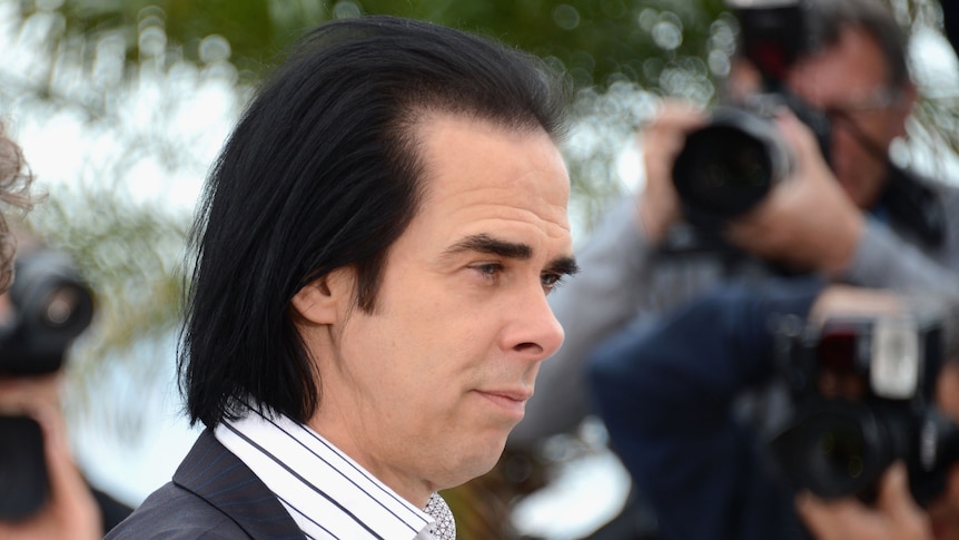 Screenwriter Nick Cave poses at the Lawless photocall during the 65th Annual Cannes Film Festival.