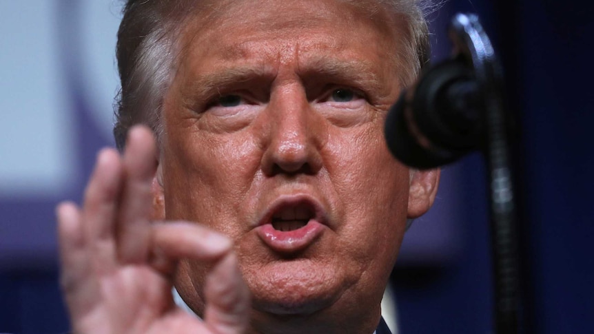 US President Donald Trump addresses the first day of the Republican National Convention