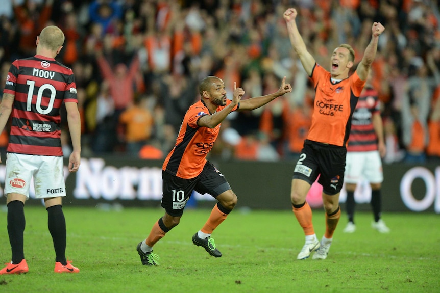 Henrique celebrates his winner in the A-League grand final for the Brisbane Roar