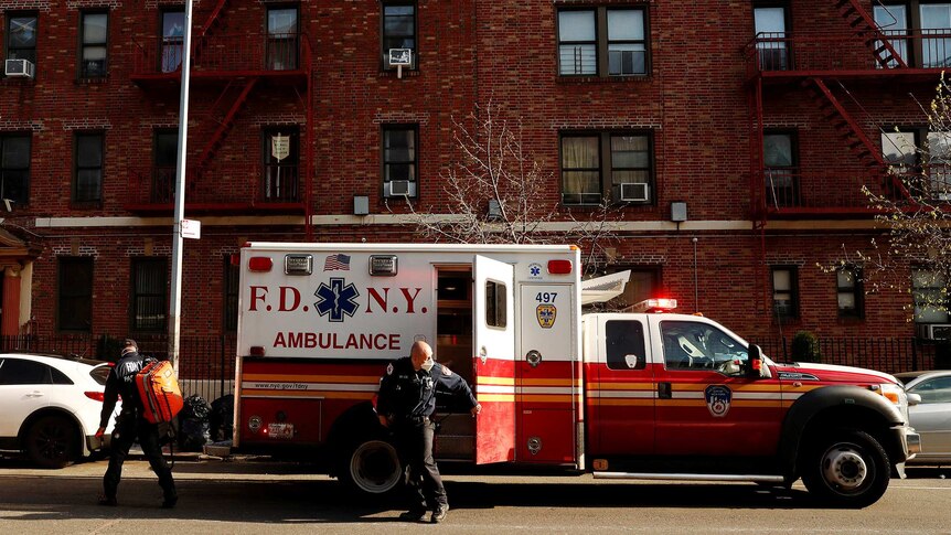 EMTs arrive at a New York home.