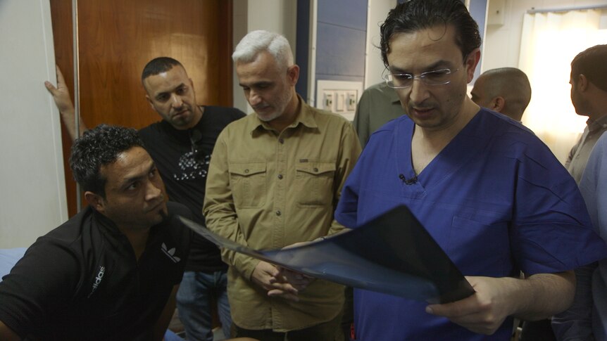 Dr Munjed Al Muderis looks at Ali Bassam's X-ray