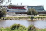 The stands at the Flemington Racecourse as seen across the Maribyrnong River.