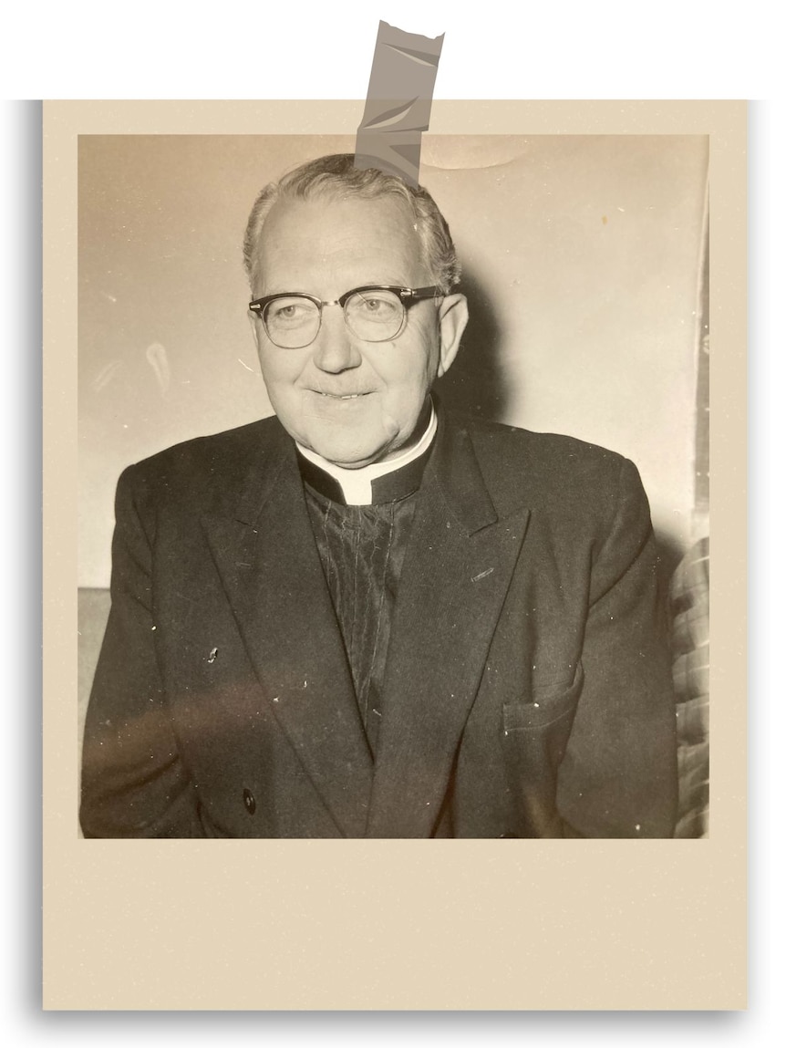 A polaroid style photo of a middle-aged Catholic priest in a clerical collar and horn-rimmed spectacles