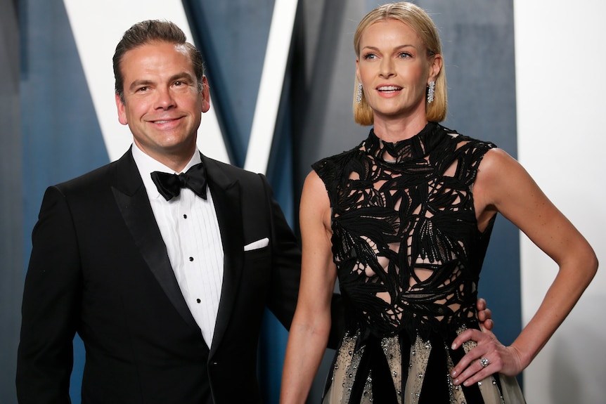 Lachlan and Sarah Murdoch pose for a photo.