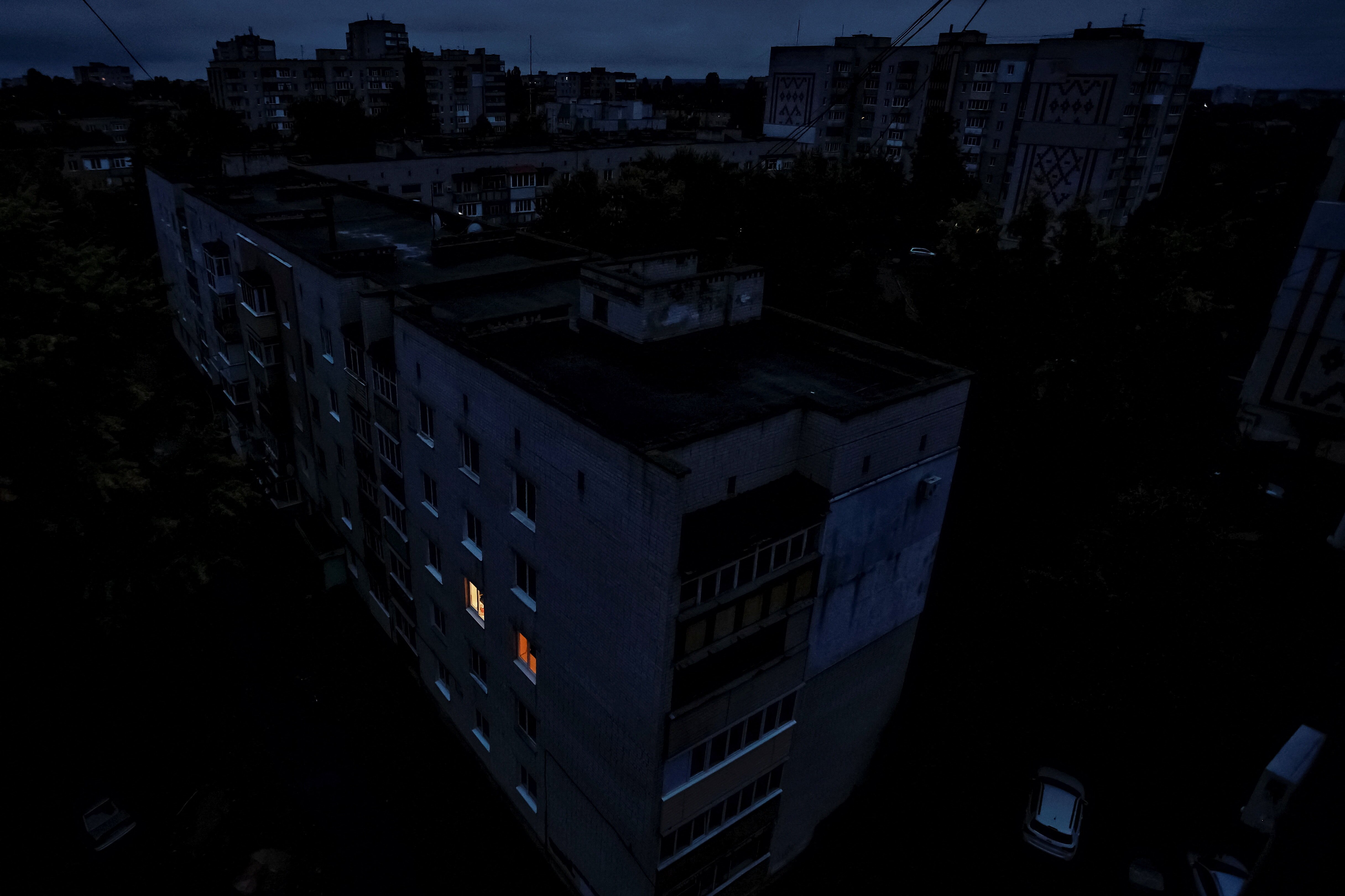 Apartment block in darkness after energy infrastructure attack
