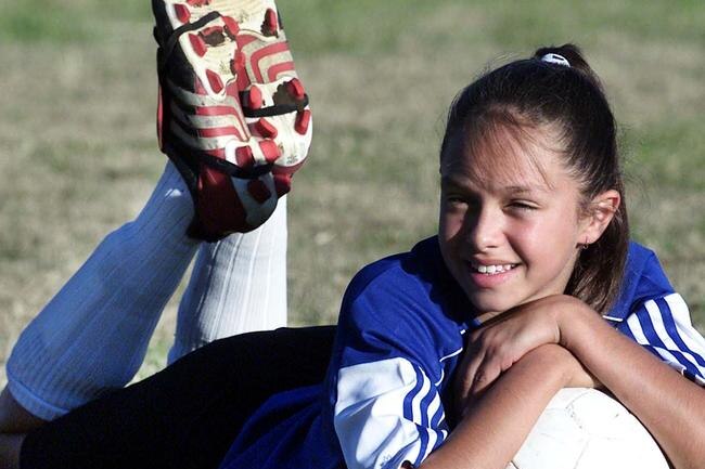 Kyah Simon, age 11, poses in her soccer kit.