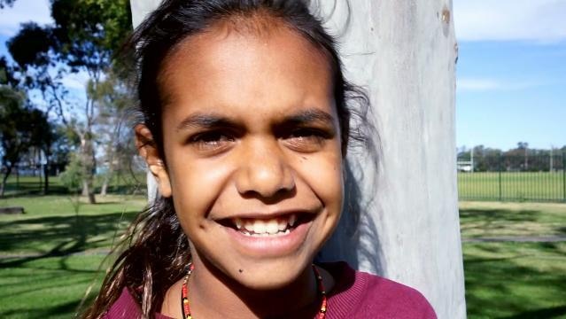 Indigenous girl smiles