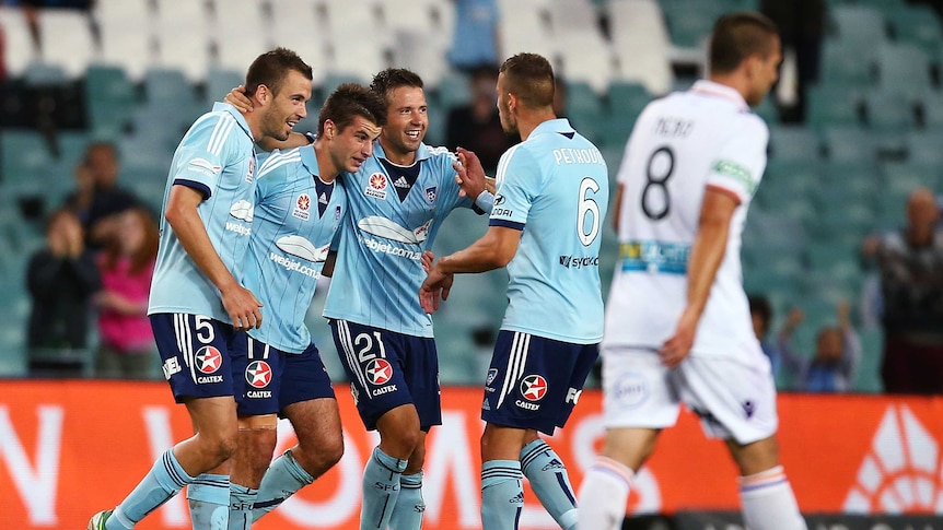 Terry Antonis celebrates the opening goal for Sydney FC against Perth Glory