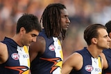 West Coast Eagles arm in arm before preliminary final