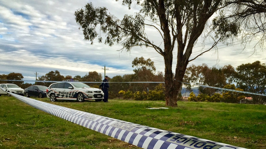 Police section off an area off Drakeford Drive