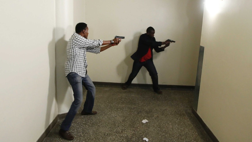 Police search search the Westgate Shopping Centre in Nairobi.