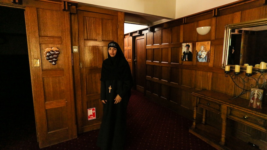 Mother Veronica stands in the foyer of the former hotel, now home to two Coptic nuns.